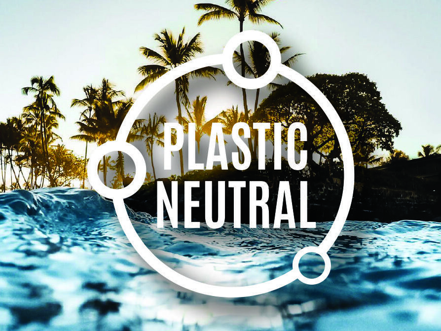 Plastic Neutral Logo on email header An ocean wave in the foreground with palm trees silhouetted against a sunset sky in the background. Overlaid on the image is a circular emblem with the text "Plastic Neutral" inside.