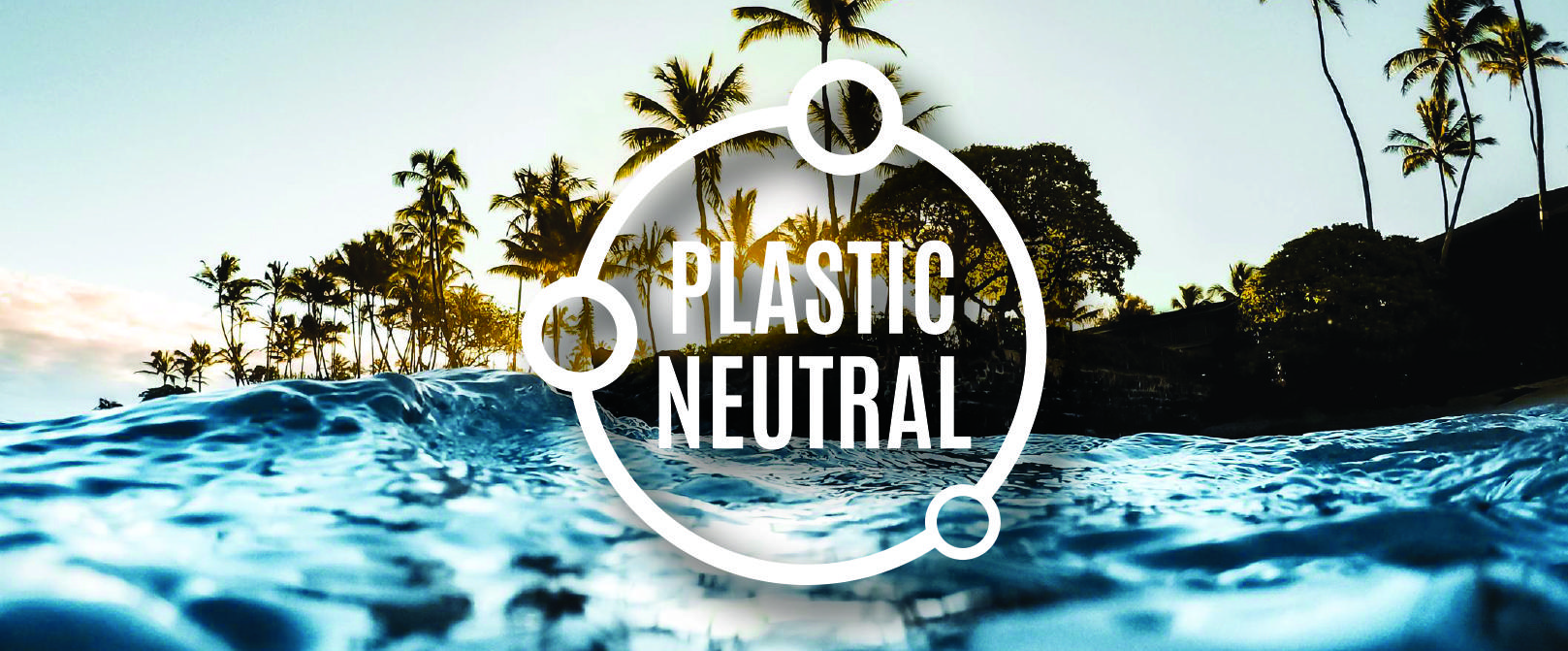 An ocean wave in the foreground with palm trees silhouetted against a sunset sky in the background. Overlaid on the image is a circular emblem with the text "Plastic Neutral" inside.