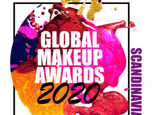The image displays a vibrant logo for the "Global Makeup Awards 2020 Scandinavia," featuring colorful splashes of pink, red, orange, and gold paint behind the text.