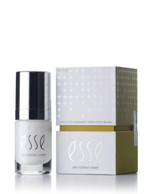 A small bottle of Esse Eye Contour Cream is positioned next to its packaging box. The sleek bottle features a silver cap and a white label with the brand name "Esse." The box is adorned with white plus signs on a grey and green background.